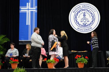  Wisconsin ABD - Wisconsin 'deki Marian Üniversitesi' nde mezuniyet kutlaması, tutkuları eyleme dönüştürme ve ilham verme amaçlı bir eğitim sunan özel bir Katolik Üniversitesi 'dir.