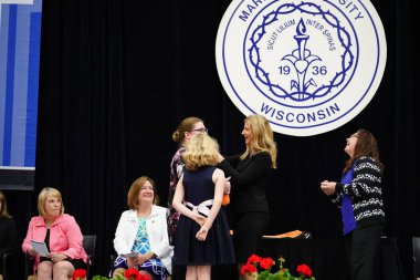  Wisconsin ABD - Wisconsin 'deki Marian Üniversitesi' nde mezuniyet kutlaması, tutkuları eyleme dönüştürme ve ilham verme amaçlı bir eğitim sunan özel bir Katolik Üniversitesi 'dir.