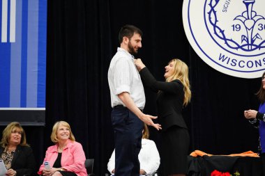  Wisconsin ABD - Wisconsin 'deki Marian Üniversitesi' nde mezuniyet kutlaması, tutkuları eyleme dönüştürme ve ilham verme amaçlı bir eğitim sunan özel bir Katolik Üniversitesi 'dir.