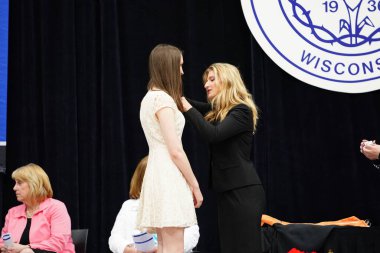  Wisconsin ABD - Wisconsin 'deki Marian Üniversitesi' nde mezuniyet kutlaması, tutkuları eyleme dönüştürme ve ilham verme amaçlı bir eğitim sunan özel bir Katolik Üniversitesi 'dir.