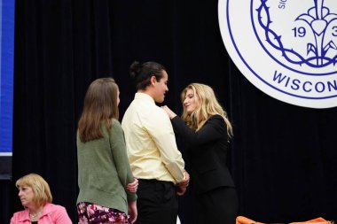  Wisconsin ABD - Wisconsin 'deki Marian Üniversitesi' nde mezuniyet kutlaması, tutkuları eyleme dönüştürme ve ilham verme amaçlı bir eğitim sunan özel bir Katolik Üniversitesi 'dir.