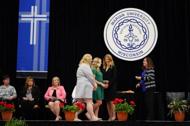  Wisconsin ABD - Wisconsin 'deki Marian Üniversitesi' nde mezuniyet kutlaması, tutkuları eyleme dönüştürme ve ilham verme amaçlı bir eğitim sunan özel bir Katolik Üniversitesi 'dir.