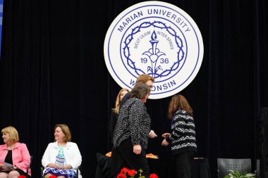  Wisconsin ABD - Wisconsin 'deki Marian Üniversitesi' nde mezuniyet kutlaması, tutkuları eyleme dönüştürme ve ilham verme amaçlı bir eğitim sunan özel bir Katolik Üniversitesi 'dir.