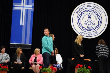  Wisconsin ABD - Wisconsin 'deki Marian Üniversitesi' nde mezuniyet kutlaması, tutkuları eyleme dönüştürme ve ilham verme amaçlı bir eğitim sunan özel bir Katolik Üniversitesi 'dir.