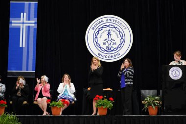  Wisconsin ABD - Wisconsin 'deki Marian Üniversitesi' nde mezuniyet kutlaması, tutkuları eyleme dönüştürme ve ilham verme amaçlı bir eğitim sunan özel bir Katolik Üniversitesi 'dir.
