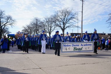 Green Bay, Wisconsin , USA - November 23rd, 2019: Notre Dame Academy musical marching band marched in 36th Annual Prevea Green Bay Holiday Parade hosted by Downtown Green Bay. clipart