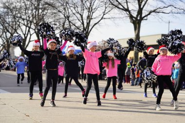 Green Bay, Wisconsin / USA - November 23rd, 2019: Green Bay, Wisconsin held 36th Annual Prevea Green Bay Holiday Christmas Parade hosted by Downtown Green Bay. clipart