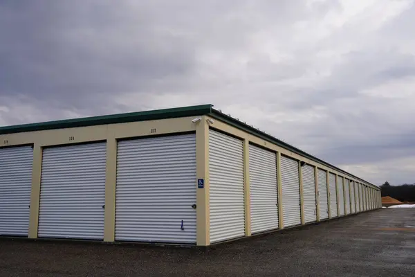 Green and Tan storage units holding the owner's property.