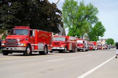 Wisconsin Dells, Wisconsin USA - May 31, 2021: Fire truck engines from Kilbourn Fire Department drove through memorial day parade. clipart