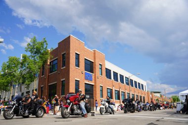 Milwaukee, Wisconsin USA - June 19th, 2021: African American motorcycle gangs participated and rode on motorcycles in Juneteenth celebration parade. clipart