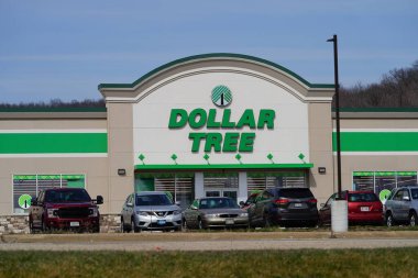Fond du Lac, Wisconsin USA - March 14th, 2024: Dollar Tree store logo sign on a building. clipart
