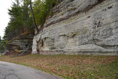 Rock formation on the side of a cliff at Rockbridge, Wisconsin nature park. clipart