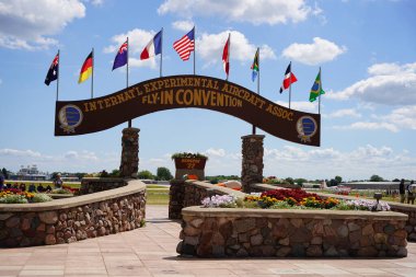 Oshkosh, Wisconsin USA - July 30th, 2022: Sign at the EAA airshow for International Experimental Aircraft Association fly-in convention clipart