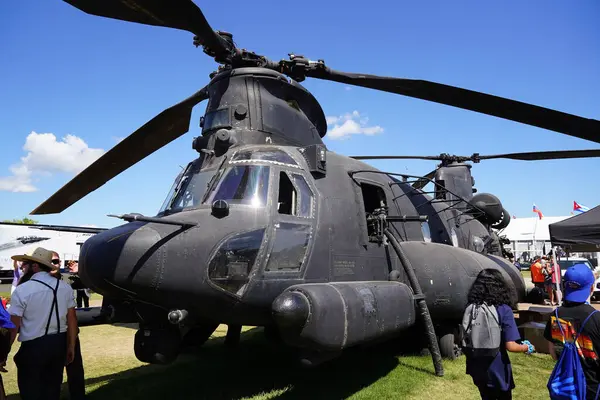 stock image Oshkosh, Wisconsin USA - July 30th, 2022: Boeing AH-64 Apache attack helicopter was on display at EAA for spectators to see.