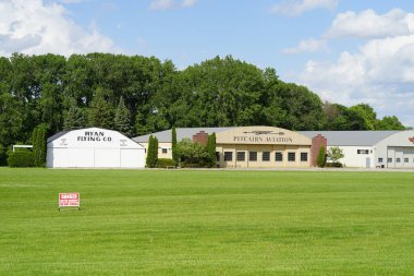 Oshkosh, Wisconsin USA - May 9th, 2024: Experimental Aircraft Association EAA building and exhibit museum. clipart