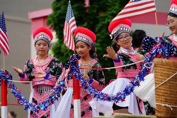 stock image Sheboygan, Wisconsin USA - July 4th, 2024: Hmong community came out and participated in freedom pride parade marching downtown and interacting with spectators.