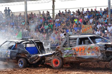 Fond du Lac, Wisconsin USA - July 21st, 2024: Hollywood Motorsports Entertainment held their annual paws for the cause demolition derby car wrecking at Fond du Lac county fair. clipart