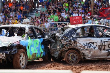 Fond du Lac, Wisconsin USA - July 21st, 2024: Hollywood Motorsports Entertainment held their annual paws for the cause demolition derby car wrecking at Fond du Lac county fair. clipart