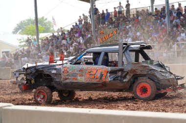 Fond du Lac, Wisconsin USA - July 21st, 2024: Hollywood Motorsports Entertainment held their annual paws for the cause demolition derby car wrecking at Fond du Lac county fair. clipart