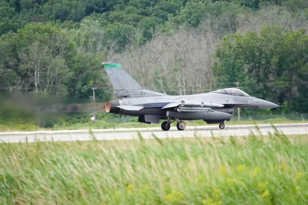 stock image Camp Douglas, Wisconsin USA - August 9th, 2024: United States Air Force fighter jets F-35 and F-16 took off and landed at Volk Air Field during the Northern Lighting Combat training exercise.