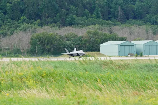 stock image Camp Douglas, Wisconsin USA - August 9th, 2024: United States Air Force fighter jets F-35 and F-16 took off and landed at Volk Air Field during the Northern Lighting Combat training exercise.