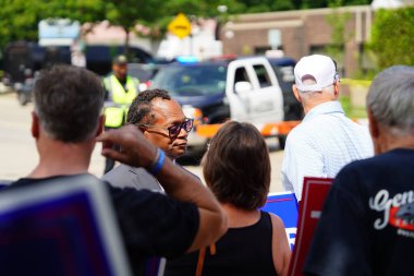 Milwaukee, Wisconsin USA - August 16th, 2024: Tim Rogers for Republican U.S. House for Wisconsin's 4th Congressional District spoke with Trump and JD Vance Supporters at a rally. clipart