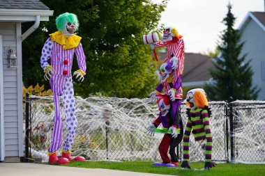 Fond du Lac, Wisconsin USA - October 4th, 2024: Homeowners of the community dressed up their house and yard with scary Halloween decorations for 2024. clipart