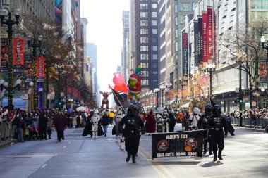 Chicago, Illinois USA - November 23th 2023: Members of the 501st Midwest Garrison dressed up in Star Wars Costumes and participated in 2023 Chicago Thanksgiving Parade clipart