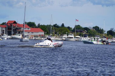 Sheboygan, Wisconsin USA - August 11th, 2024: High speed boats cruised around Lake Michigan. clipart