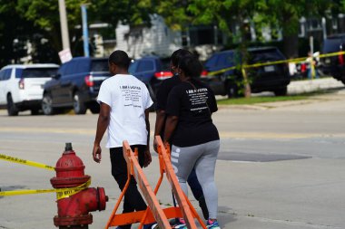 Milwaukee, Wisconsin USA - August 16th, 2024: Pro President Trump and Pro VP J.D. Vance supporters rallied outside the Milwaukee Police Association during J.D. Vance's political campaign stop. clipart