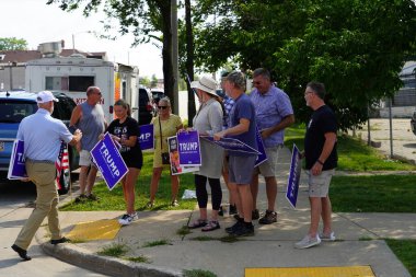 Milwaukee, Wisconsin USA - August 16th, 2024: Pro President Trump and Pro VP J.D. Vance supporters rallied outside the Milwaukee Police Association during J.D. Vance's political campaign stop. clipart