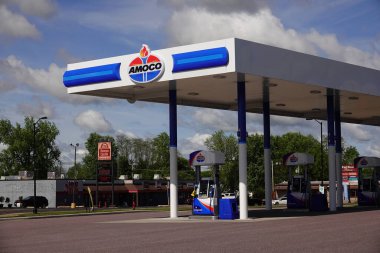 Mauston, Wisconsin USA - May 23rd, 2025: Amoco fuel station sign on a fuel station building advertising to the community.