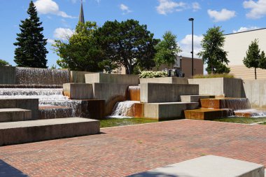 Man made Plaza waterfall fountain in the center of downtown.
