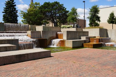 Man made Plaza waterfall fountain in the center of downtown.