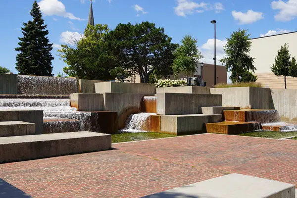 Man made Plaza waterfall fountain in the center of downtown.
