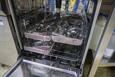 used gynecological instruments are cleaned in a dishwasher