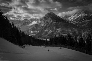 the snow covered mountains of the austrian alps in winter 2023