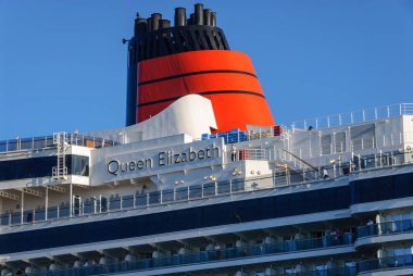 the luxury cruise ship Queen Elisabeth enters the port of Luebeck-Travemuende