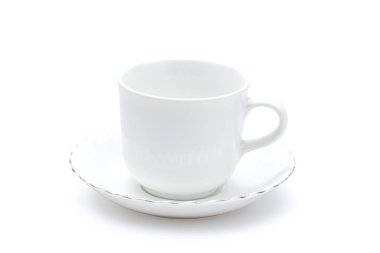 Empty white ceramic mug. Decorative flower pattern with one handle cup isolated on white background. Modern mug tea, coffee, or milk. Shiny bright color glazed vintage handmade for drinking wate