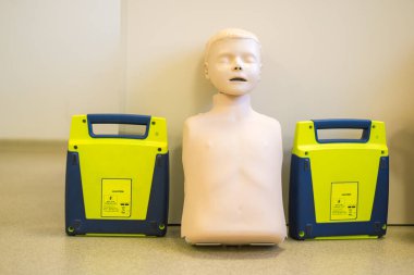 Manikin for demonstration of CPR Cardiopulmonary resuscitation for resurrected patients and Automated External Defibrillator.