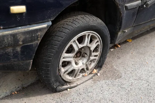 Close Damaged Tire Wheel Car Tire Leak Flat Tire Waiting Royalty Free Stock Images