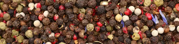 Biberli mısır. Yemek Baharatları Renkli Biberler. Yaklaş, Macro. Biber duvar kağıdı arka planı. Pankart.