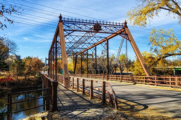 stock image Bridge built in1887 over the Mississippi River to Nicollet Island by the King Iron Bridge Co. from Cleveland, OH