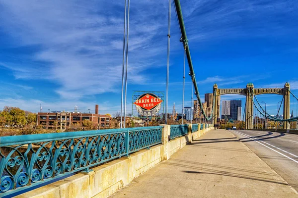 stock image Minneapolis, Minnesota - October 31, 2022: The Father Louis Hennepin Bridge in downtown Minneapolis Minnesota