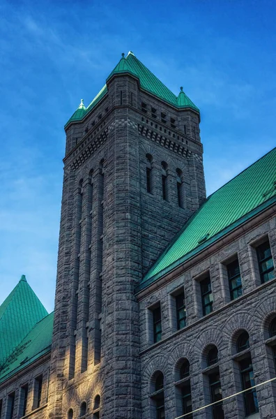 The Municipal Building, which houses both the Minneapolis City Hall and the Hennepin County Courthouse. The building is built in the Richardsonian Romanesque style