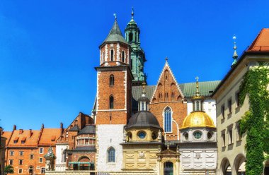Two side chapels of archcathedral: left, Vasa chapel and right, Sigismund chapel with famous gold plated roof of the dome.