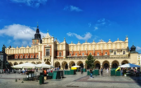 Krakow, Poland - 12 August 2022:Sukiennice building with Town Hall in the background