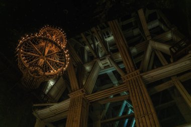 The Wieliczka Salt Mine, located in the town of Wieliczka in southern Poland, lies within the Krakow metropolitan area. Opened in the 13th century, the mine produced table salt continuously until 2007