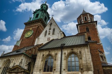 The Wawel Cathedral , formally titled the Royal Archcathedral Basilica of Saints Stanislaus and Wenceslaus, is a Roman Catholic cathedral situated on Wawel Hill in Krakow, Poland.