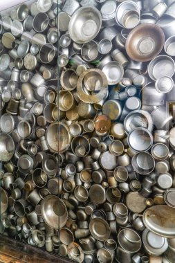 Enamelled pots and cups manufactured in famous factory during World War 2, Krakow, Poland